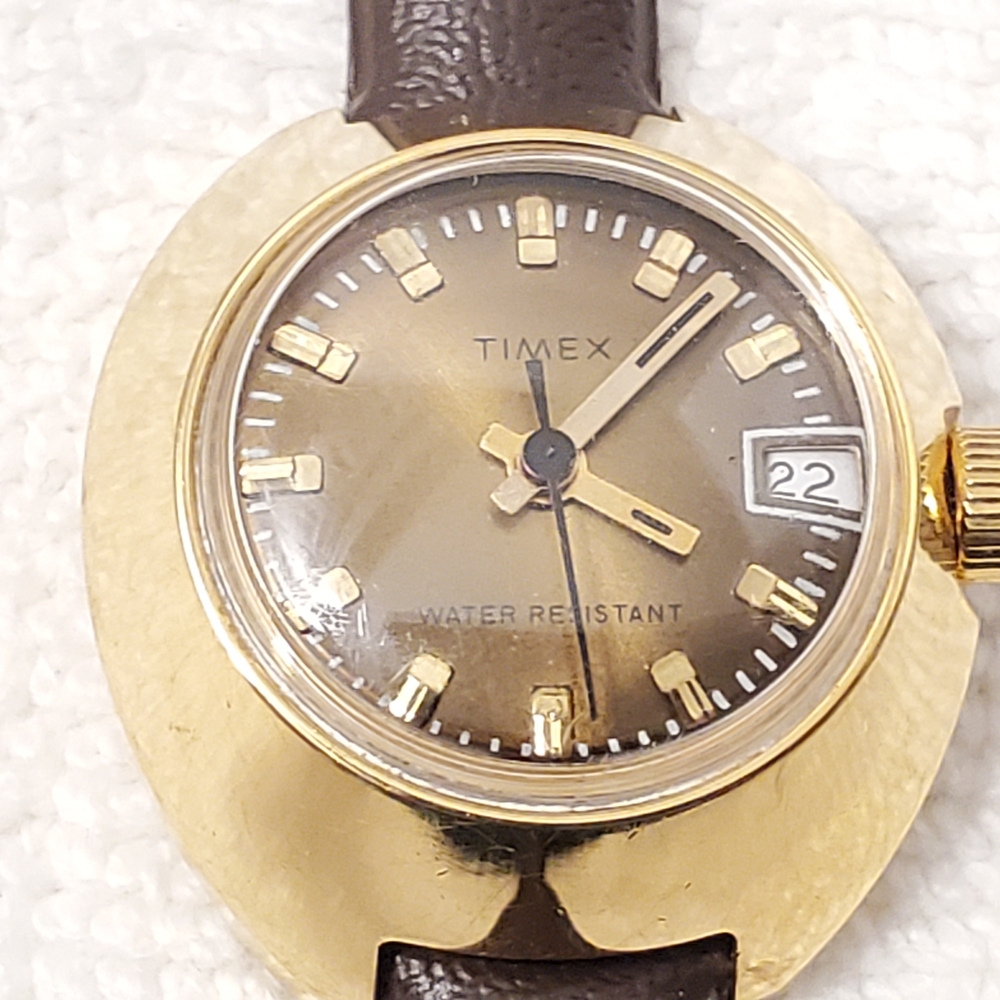 Vintage Timex Gold Plated Wind Up Analog Women's Watch Brown Dial Plastic Strap